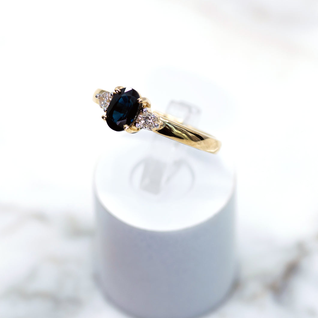 Oval-cut Sapphire and Diamond  Three Stone Ring