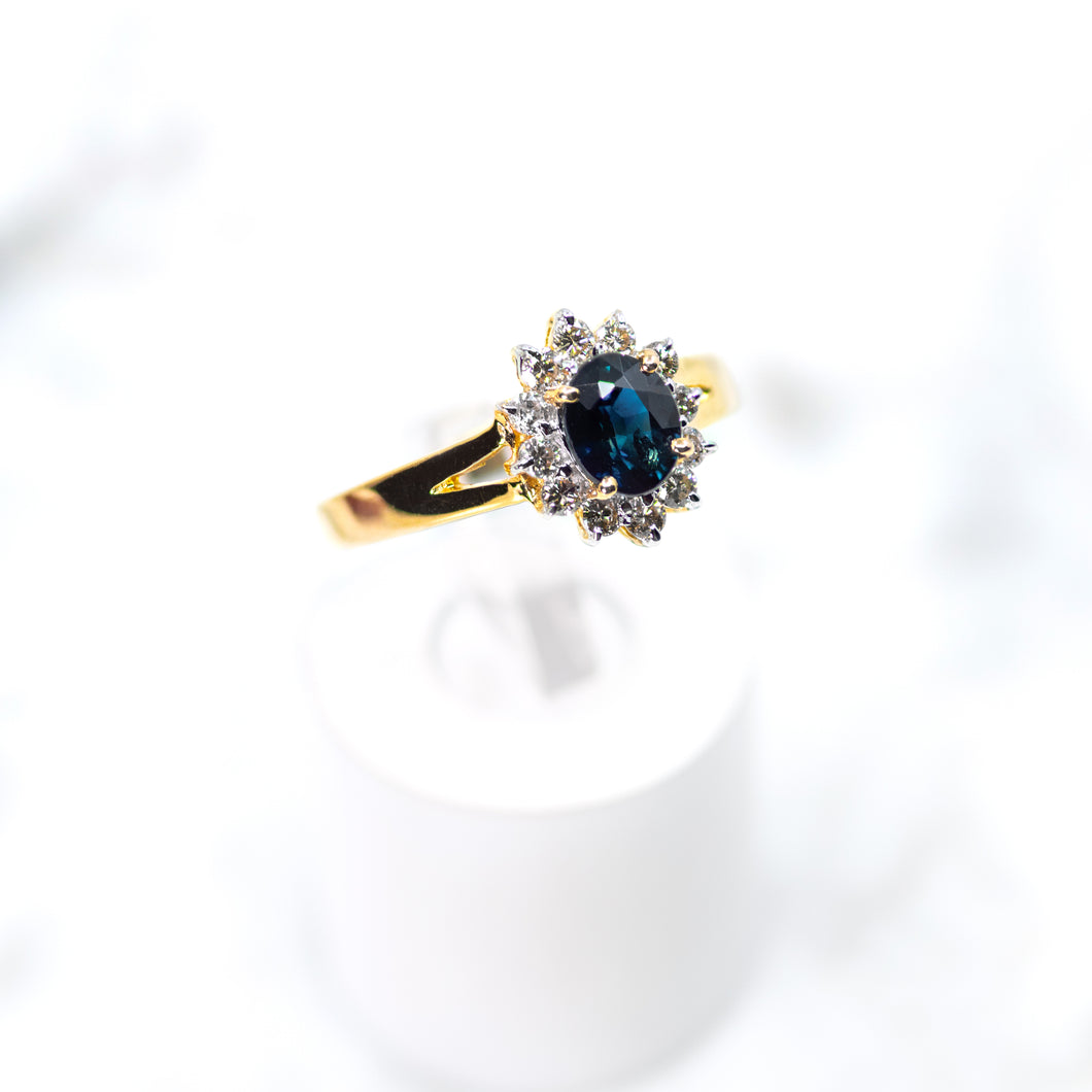 Oval-cut Sapphire and Diamond Rosette Ring