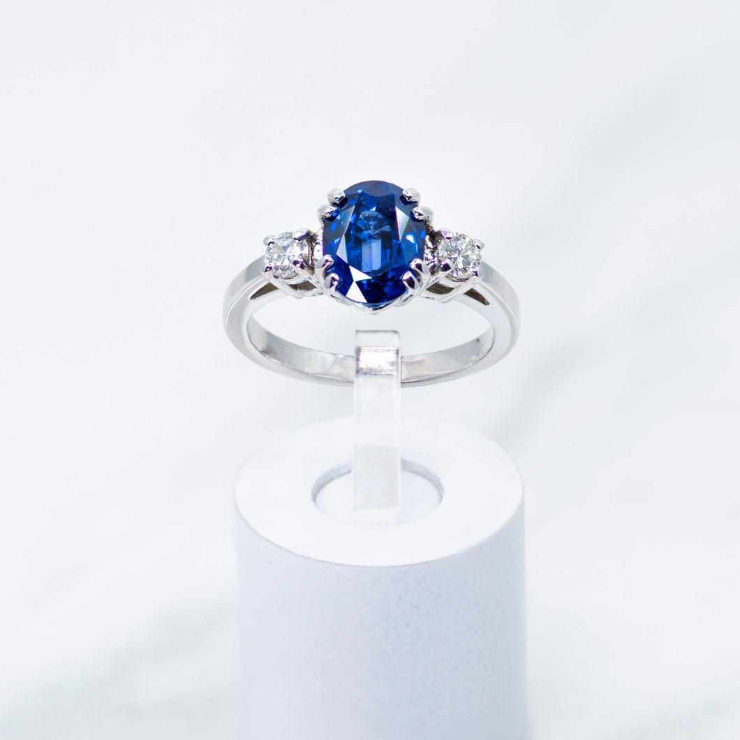 Oval-Cut Sapphire and Diamond Three Stone Ring
